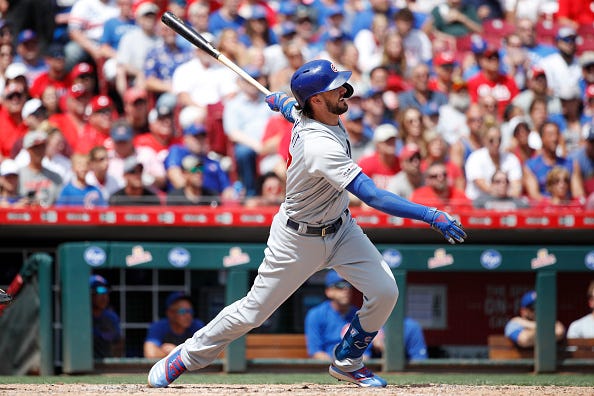 Kris Bryant crushes a home run against the Reds. 