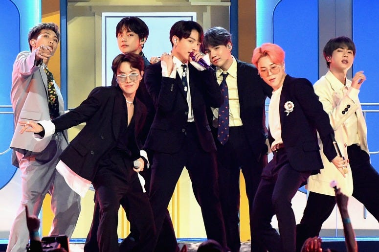 The New Mattel BTS Mini Dolls Are What Your Desk's Been Missing