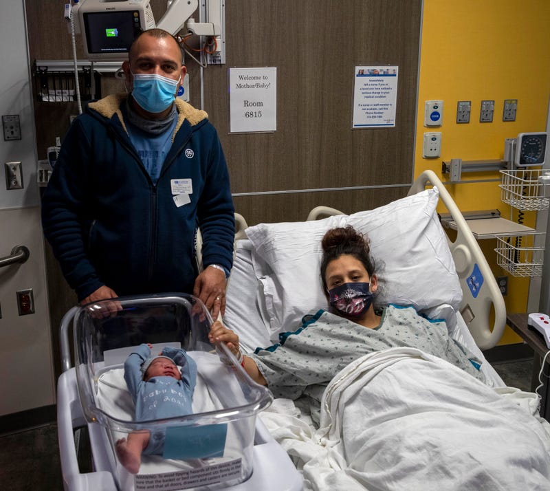 A happy new year brings a happy new baby and proud parents.