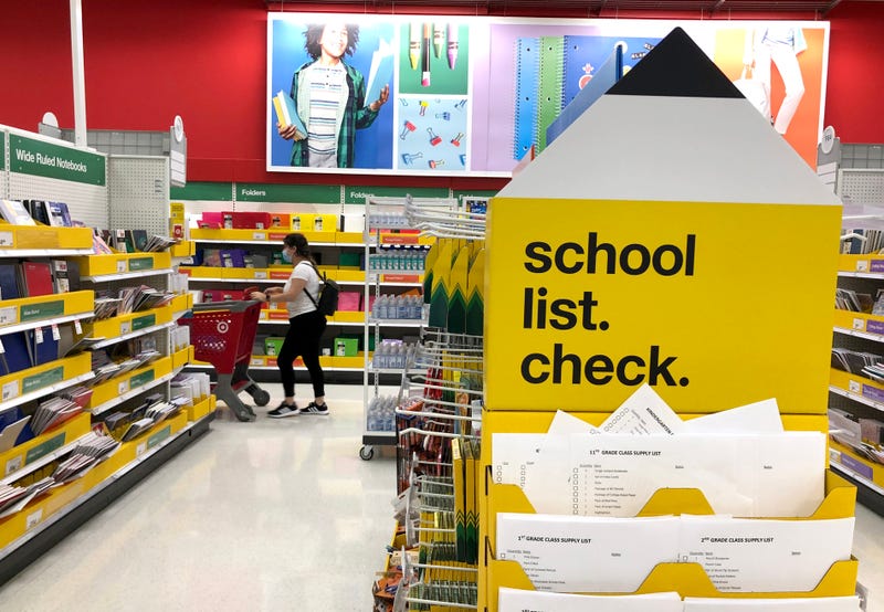 A parent shops for Back to School supplies