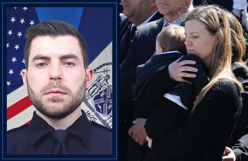 Stephanie Diller (right), the widow of NYPD Det. Jonathan Diller (left), carries her son Ryan at the funeral of her husband at St. Rose of Lima R.C. Church on March 30, 2024 in Massapequa, New York