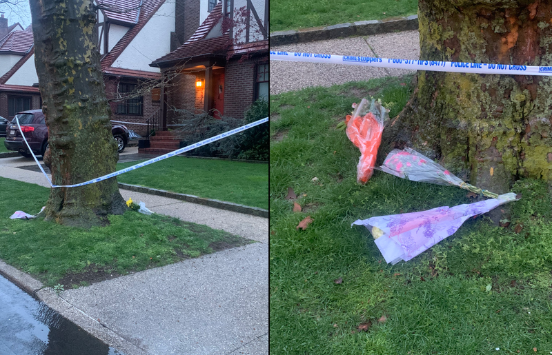 Flowers and police tape were still up at the family's Juno Street home on Tuesday morning