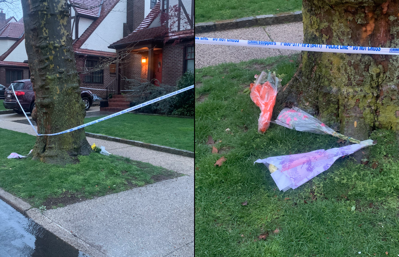 Flowers and police tape were up at the family's Juno Street home on Tuesday morning
