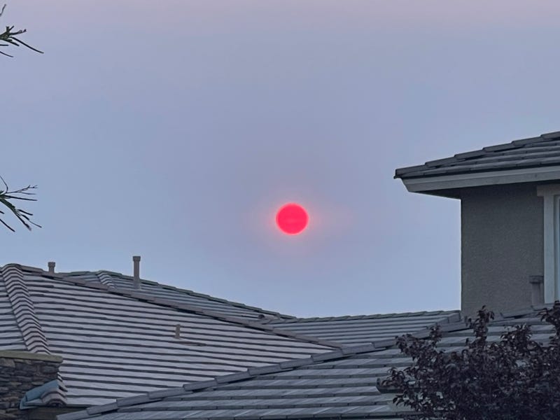 Haze from wildfire smoke filters sunlight in Las Vegas