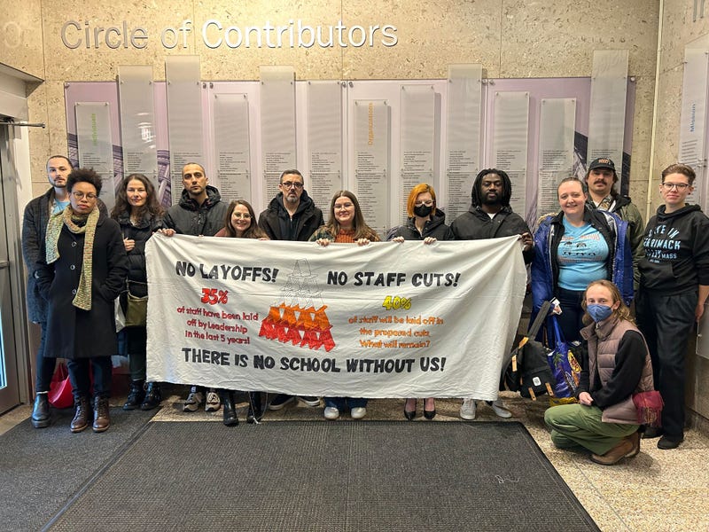 Unionized staff at Columbia College pose for a photo. They've called on the administration to stop its planned layoffs and explore other ways to manage Columbia's budget.