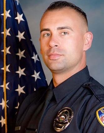 Officer arrested.