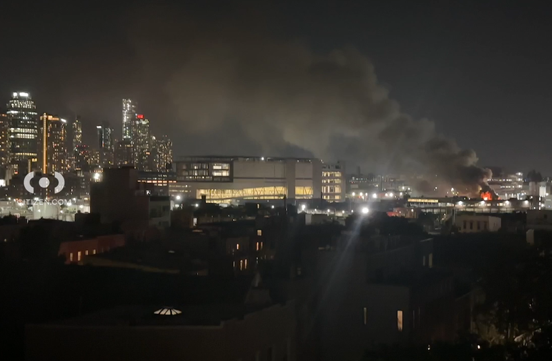 Smoke was seen rising into the night sky as firefighters battled the inferno