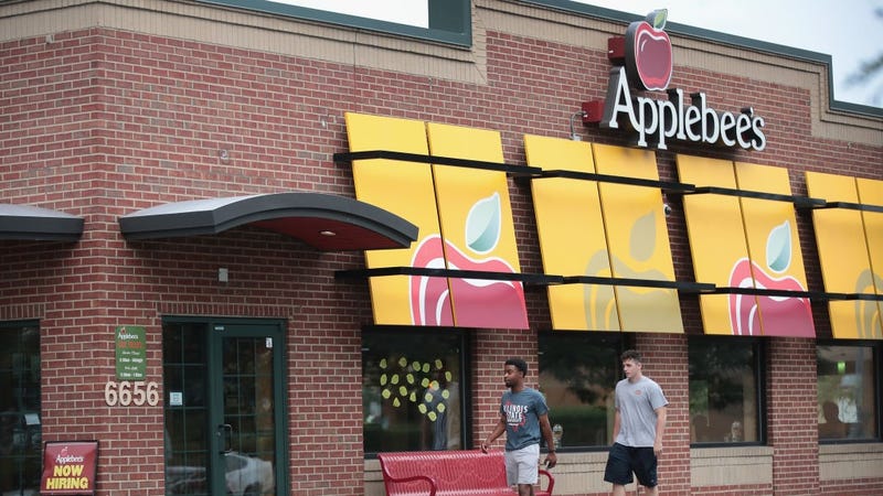 An Applebee's restaurant serves customers on August 10, 2017 in Chicago, Illinois. DineEquity, the parent company of Applebee's and IHOP, plans to close up to 160 restaurants in the first quarter of 2018. 