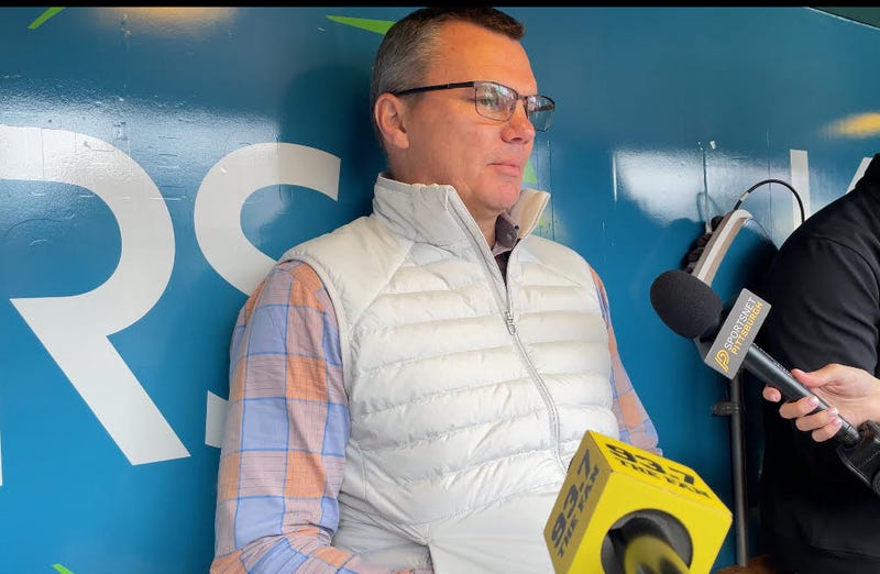Ben Cherington talking in dugout