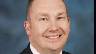 State lawmaker from central Illinois dies at age 45