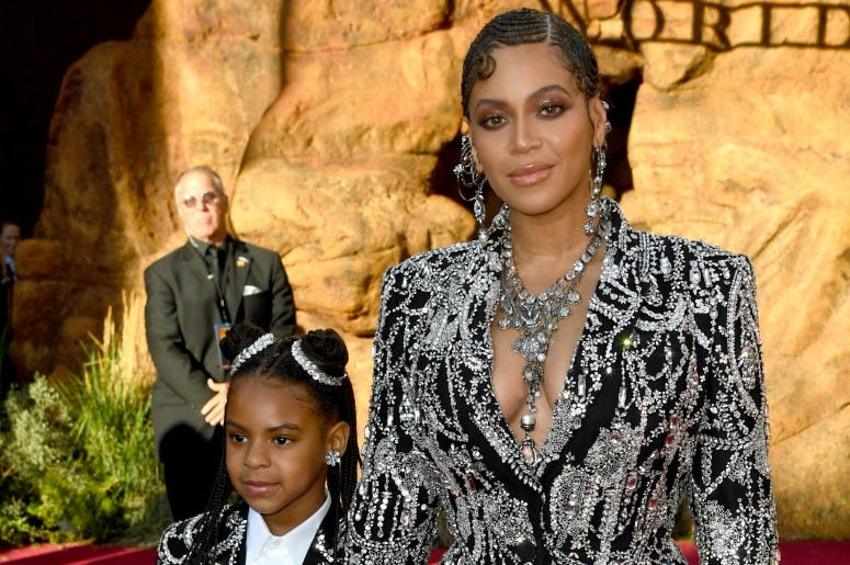 Blue Ivy Carter and Beyoncé attends the premiere of Disney's "The Lion King"