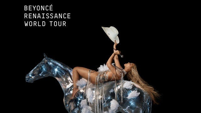 Beyoncé laying on metallic horse singing