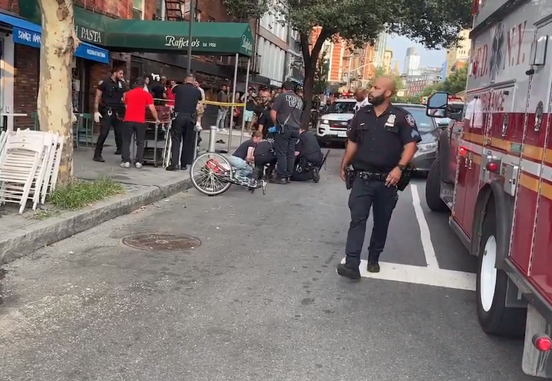 The cyclist was struck by the Mercedes driver at Houston and Sullivan streets