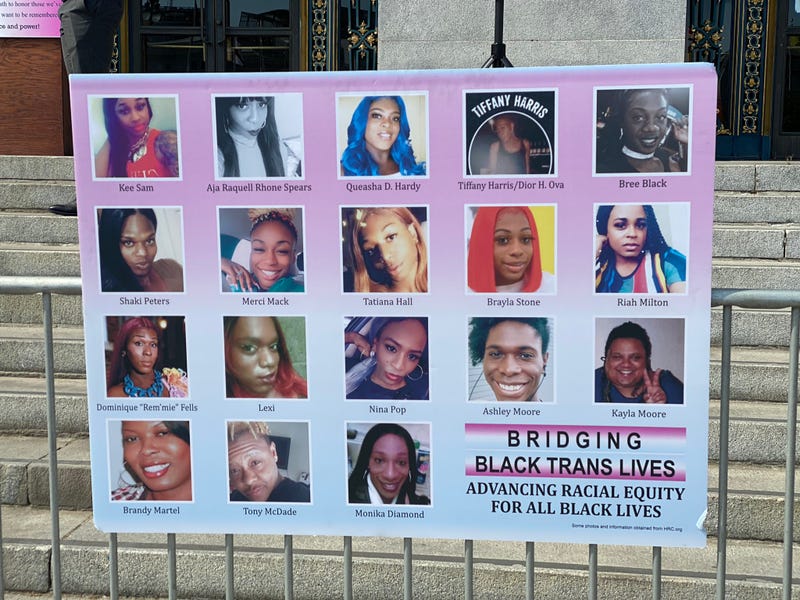 A sign shows support for Black trans women.