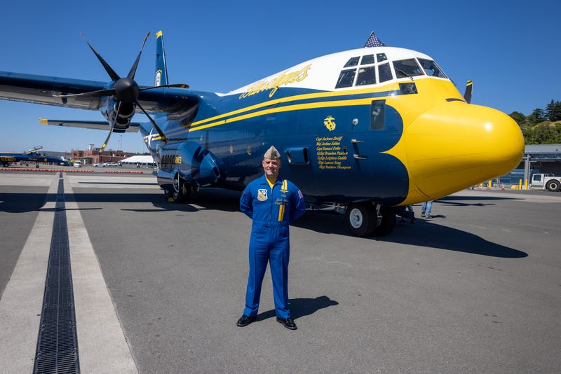 Major Joshua Soltan in front of C-130J "Fat Albert"