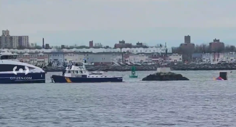 Members of the NYPD Harbor Unit rescue four people who were in the East River after their boat capsized on Sunday afternoon.