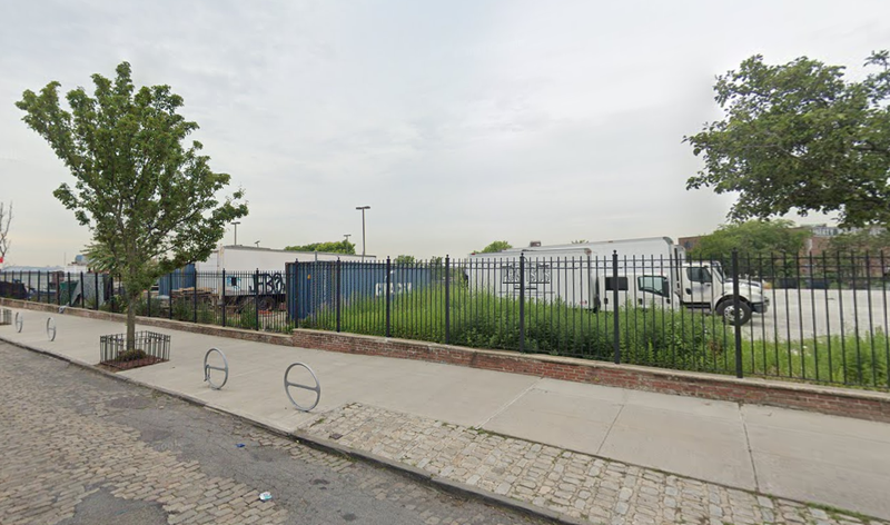 A man's body was found early Saturday morning after a boat fire was extinguished in a fenced-in parking lot in Red Hood, Brooklyn.