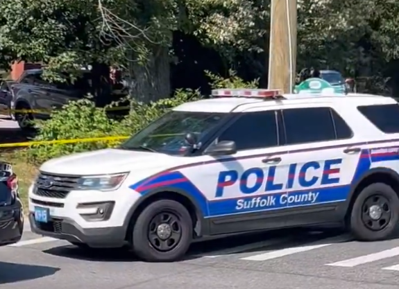 An apartment complex was surrounded by crime scene tape as Suffolk County police investigated