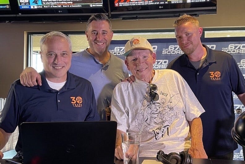 The Boers & Bernstein Show crew of, from left, Dan Bernstein, Matt Abbatacola, Terry Boers and Chris Tannehill pose for a photo as The Score's 30th birthday celebration.
