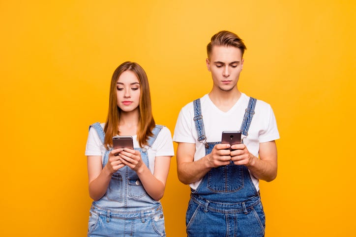 boy and girl texting