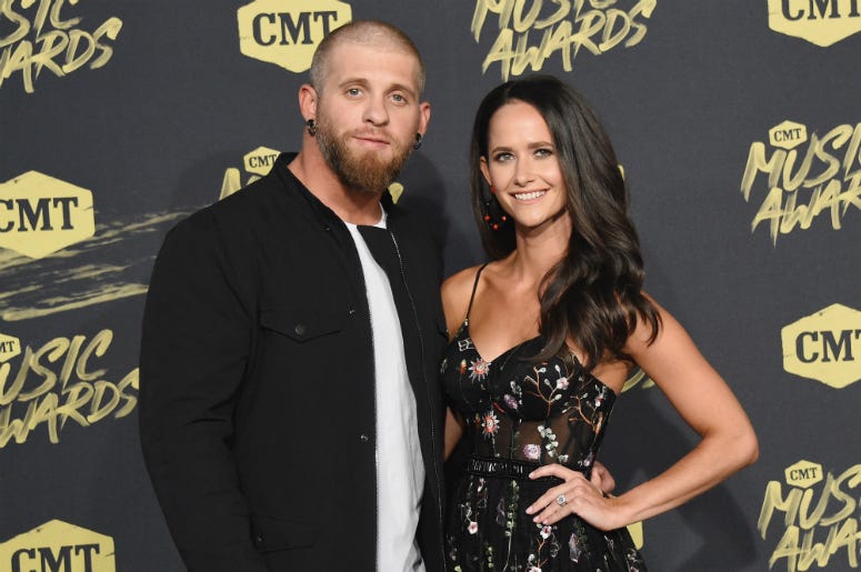 Brantley Gilbert (L) and Amber Cochran attend the 2018 CMT Music Awards at Bridgestone Arena