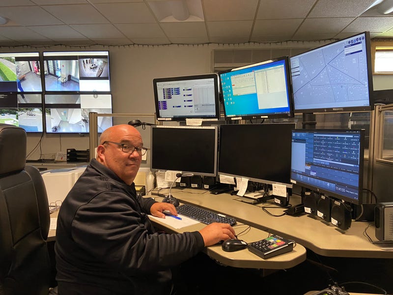 Officer James Cavanagh and Public Safety Dispatcher Christopher Brenner.