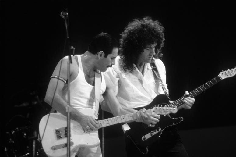 Queen members Freddie Mercury (left) and Brian May (right) during the Live Aid concert
