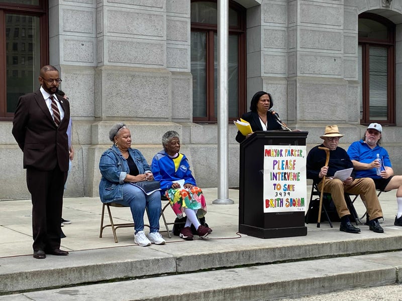 Residents of Brith Sholom speak at a rally at City Hall alongside Councilmember Curtis Jones Jr.