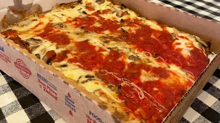Buddy's Pizza giving back to charity as new location opens in Clarkston