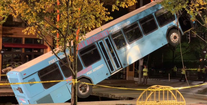Pulling bus out of sinkhole