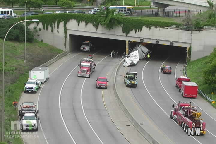 A semi-truck crash in the Lowry Hill Tunnel has I-94 closed between I-394 and I-35W in Minneapolis. MnDOT says the closure could last four or more hours.