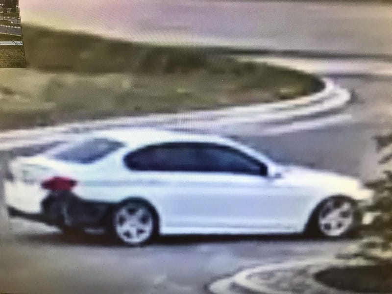 White car, surveillance photo