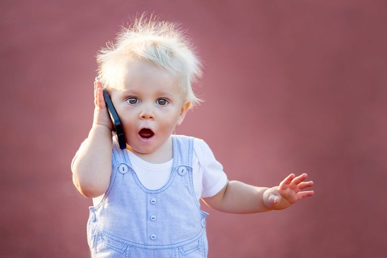 infant on cellphone
