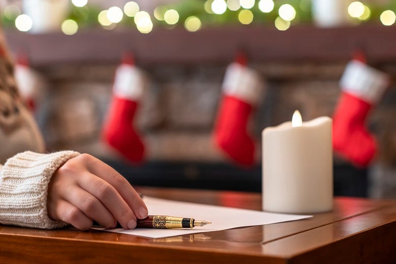 Woman writing a Christmas letter