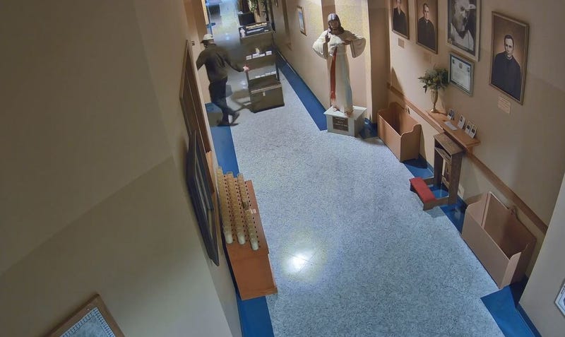 Nassau County Police released on Thursday surveillance images of a burglar who robbed the donation box of a Long Island Catholic church after breaking and entering, in hopes that someone recognizes him.