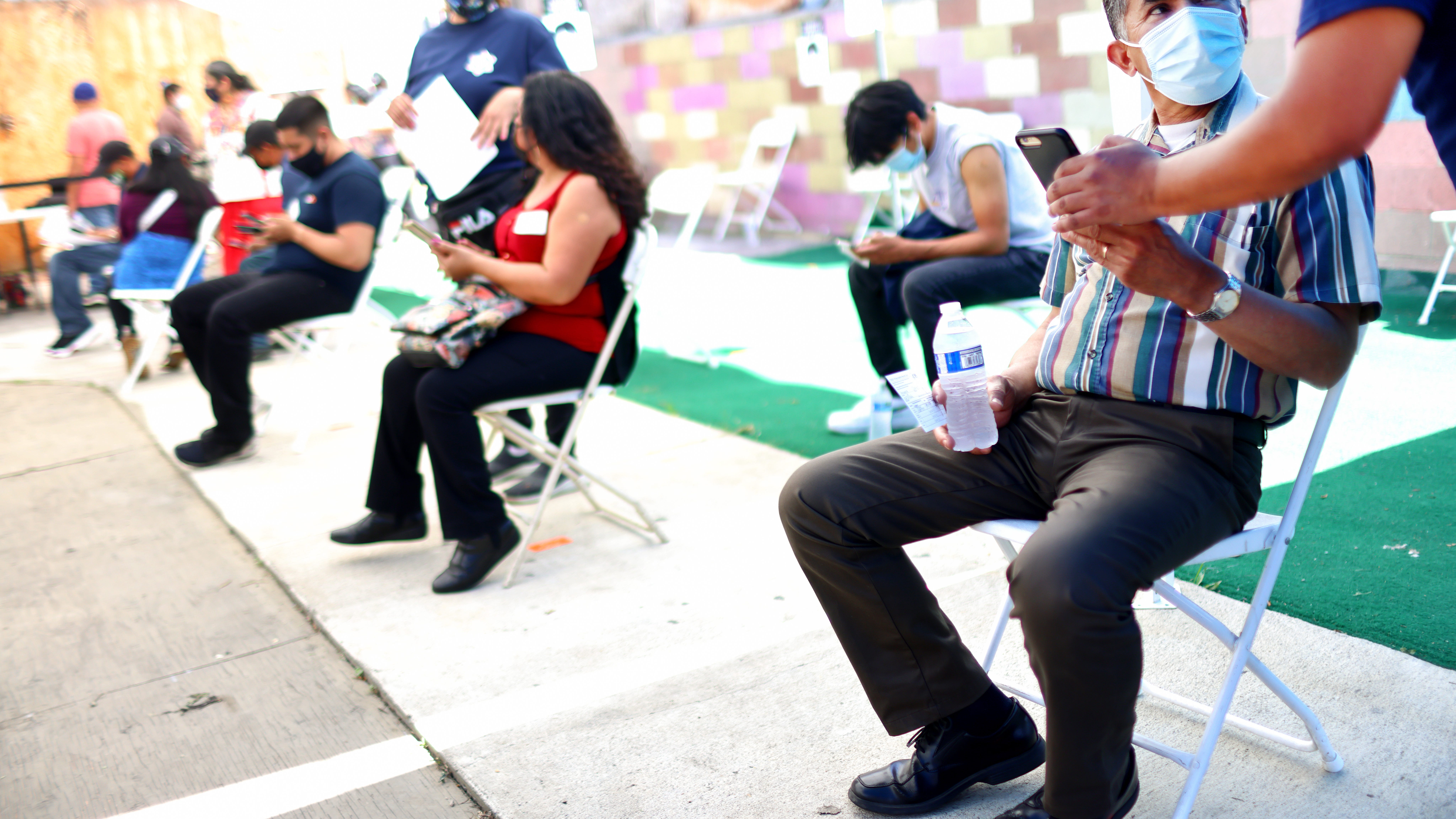 More than half of eligible Californians are at least partially vaccinated against COVID-19