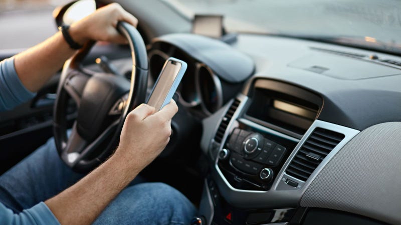 Holding a cellphone while driving