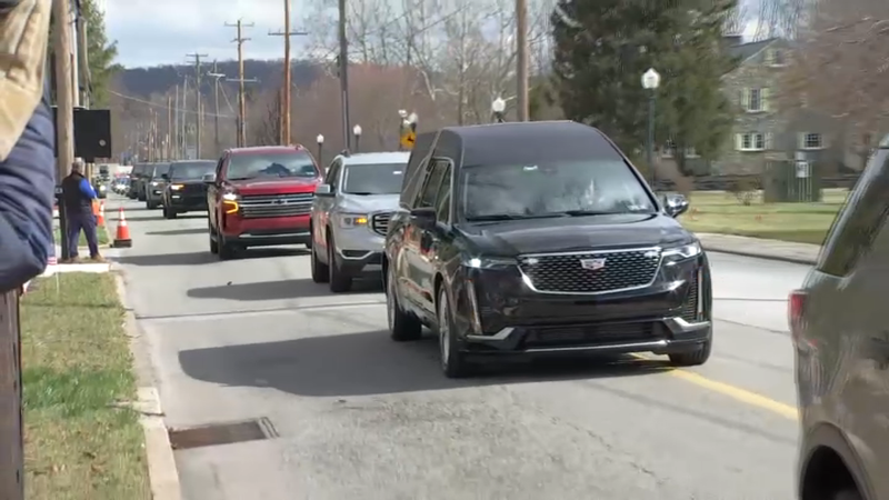 A hearse leads the funereal procession for Pa. State Police Cpl. Timothy O'Connor Jr., who was killed in the line of duty last week.