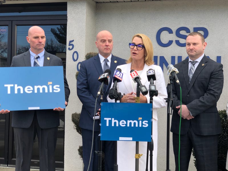 Themis Klarides stands with leaders of the Connecticut State Police Union