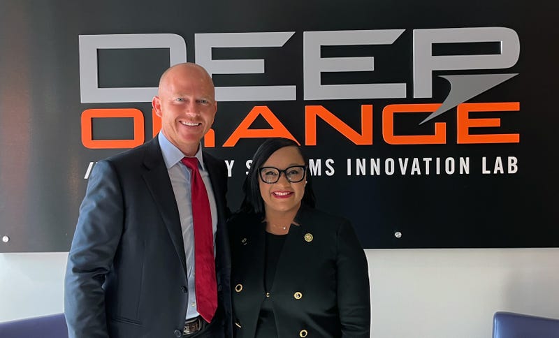 Congressman William Timmons and Congresswoman Nikema Williams stand at the entrance of the ICAR Deep Orange lab