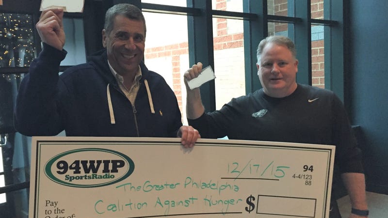Angelo Cataldi in 2015 with then-Eagles coach Chip Kelly as they make a donation to the Greater Philadelphia Coalition Against Hunger.