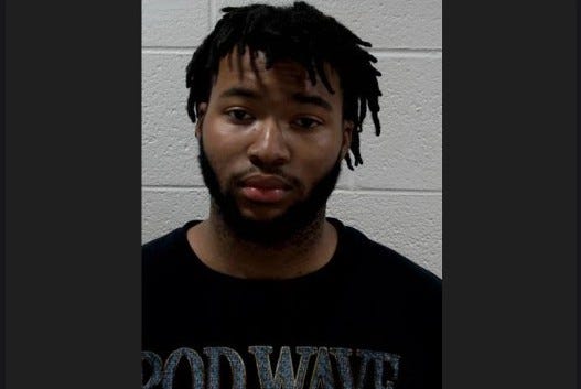 Caleb Williams is seen in a booking photo
