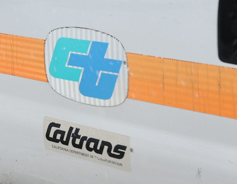 A Caltrans snowplow operates in Los Angeles County, in the San Gabriel Mountains in Angeles National Forest, on February 24, 2023 near La Canada Flintridge, California. 