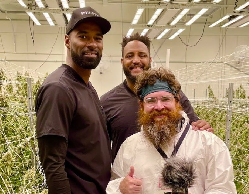 Former Detroit Lions Calvin Johnson and Rob Sims with WWJ's Zach Clark at Primitiv facility in Webberville