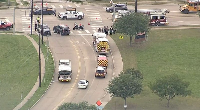 Police respond to the scene of a shooting outside Bowie High School in Arlington, Texas on Wednesday, April 24, 2024.