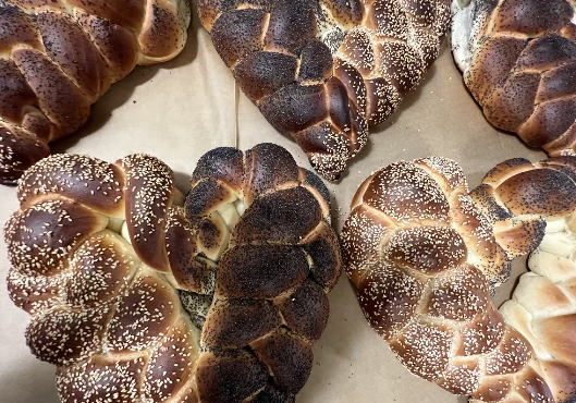 100% of proceeds from the sales of these heart-shaped challahs at Breads Bakery will be donated to Magen David Adom.
