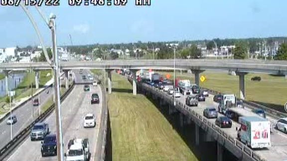 4 vehicle crash involving a school bus snarls traffic on I-10W