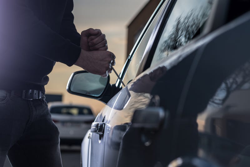 A man attempts to steal a car