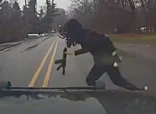 Carjacking suspect runs in front of Southfield police car