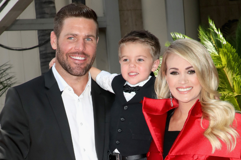 Mike Fisher and Isaiah Michael Fisher attend as Carrie Underwood is honored with a star on The Hollywood Walk of Fame on September 20, 2018 in Hollywood, California